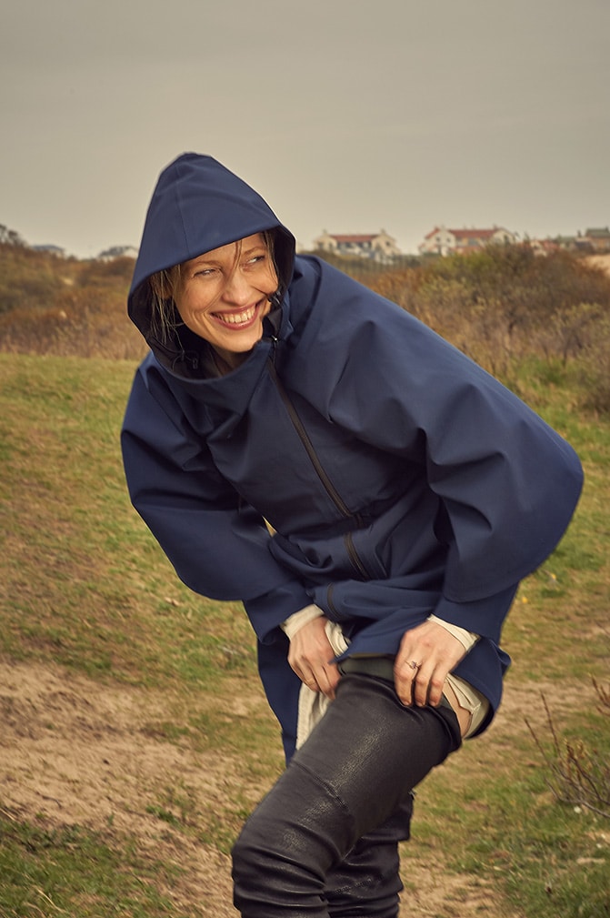 The Blue Aqua Raincoat - being caught in the rain