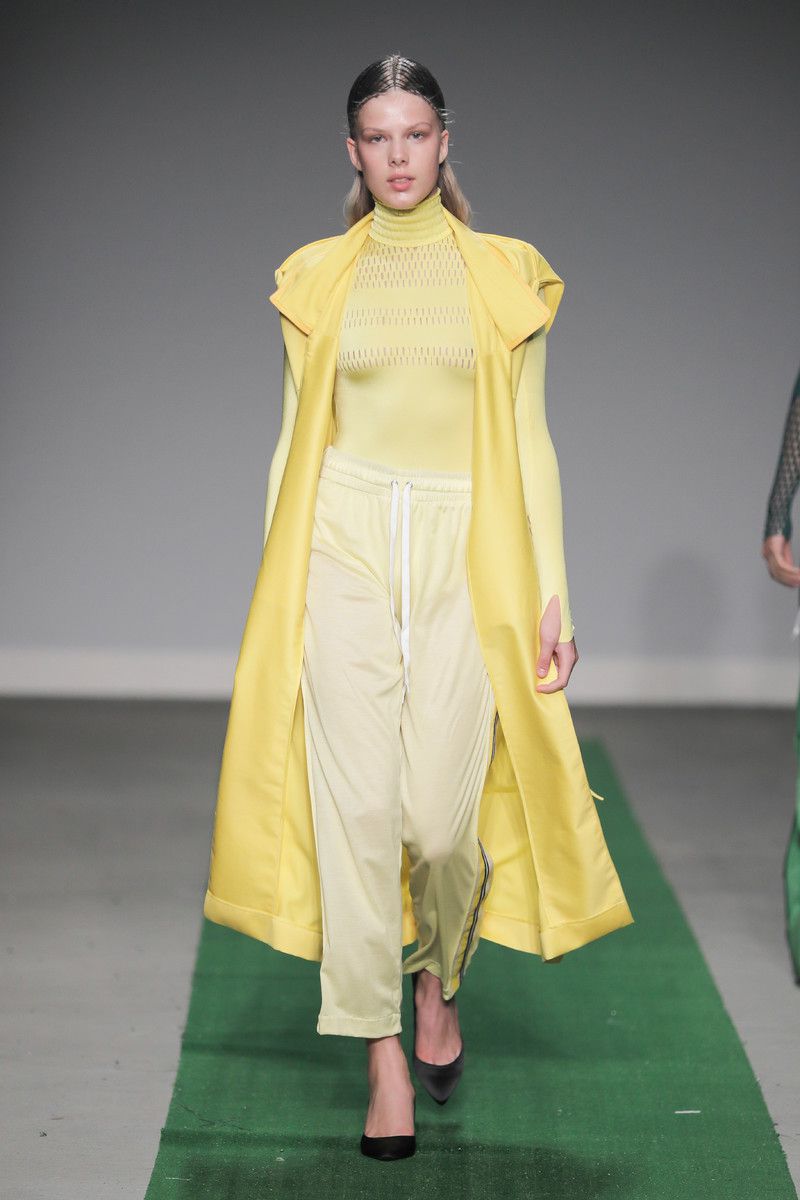 M.E.N. showing at the Mercedes-Benz Amsterdam Fashion Week - yellow coat